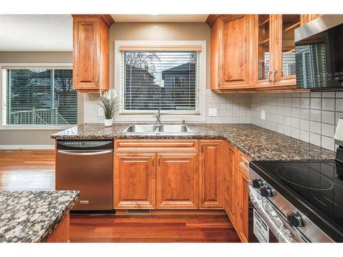 109 Everglade Circle Sw, Calgary, AB - Indoor Photo Showing Kitchen With Double Sink