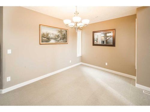 109 Everglade Circle Sw, Calgary, AB - Indoor Photo Showing Other Room