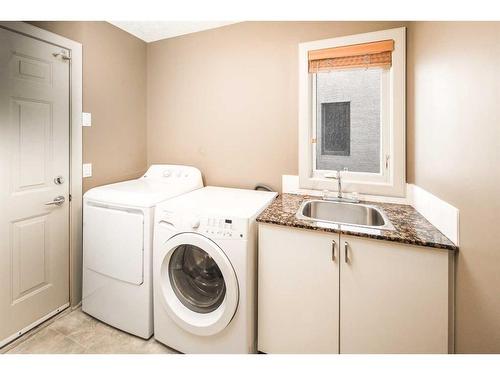 109 Everglade Circle Sw, Calgary, AB - Indoor Photo Showing Laundry Room