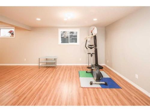 109 Everglade Circle Sw, Calgary, AB - Indoor Photo Showing Gym Room