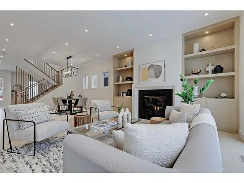 627 18 Avenue Nw, Calgary, AB - Indoor Photo Showing Living Room With Fireplace