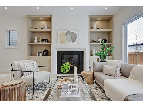 627 18 Avenue Nw, Calgary, AB - Indoor Photo Showing Living Room With Fireplace