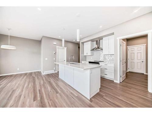 180 Magnolia Terrace Se, Calgary, AB - Indoor Photo Showing Kitchen With Upgraded Kitchen