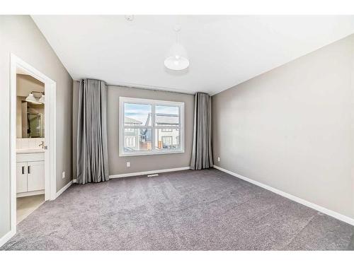 180 Magnolia Terrace Se, Calgary, AB - Indoor Photo Showing Other Room