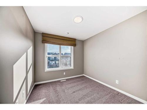 180 Magnolia Terrace Se, Calgary, AB - Indoor Photo Showing Other Room