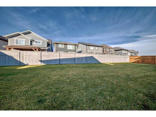 180 Magnolia Terrace Se, Calgary, AB - Outdoor With Backyard