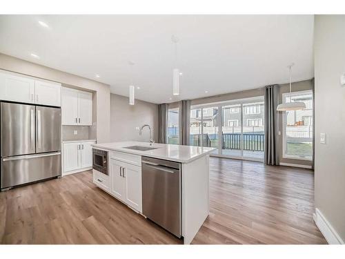 180 Magnolia Terrace Se, Calgary, AB - Indoor Photo Showing Kitchen With Upgraded Kitchen