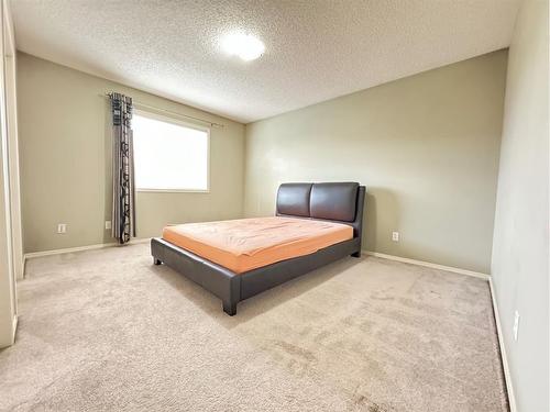 30 Panatella Street Nw, Calgary, AB - Indoor Photo Showing Bedroom