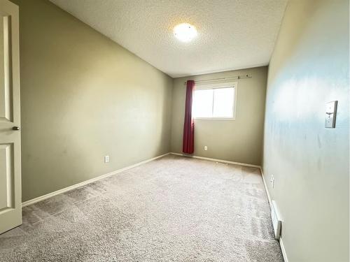 30 Panatella Street Nw, Calgary, AB - Indoor Photo Showing Other Room