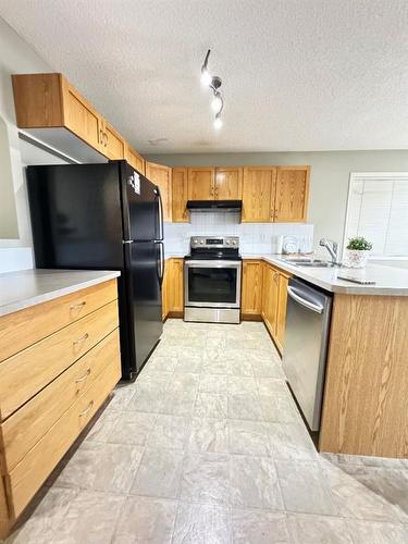 30 Panatella Street Nw, Calgary, AB - Indoor Photo Showing Kitchen