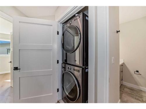 115-1330 1St Ave, Canmore, AB - Indoor Photo Showing Laundry Room