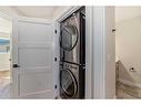 115-1330 1St Ave, Canmore, AB  - Indoor Photo Showing Laundry Room 