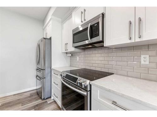 308-4150 Seton Drive Se, Calgary, AB - Indoor Photo Showing Kitchen With Stainless Steel Kitchen