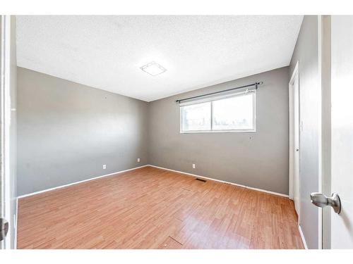 47 Queen Isabella Close Se, Calgary, AB - Indoor Photo Showing Other Room