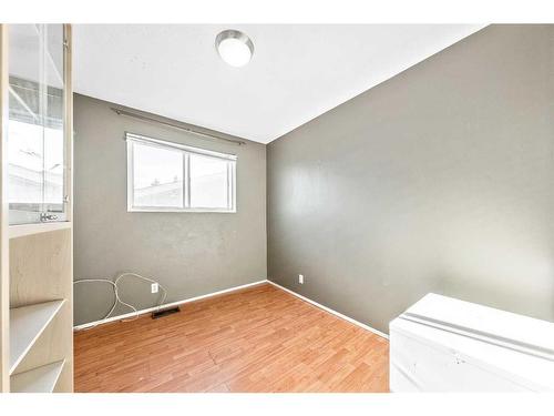 47 Queen Isabella Close Se, Calgary, AB - Indoor Photo Showing Other Room