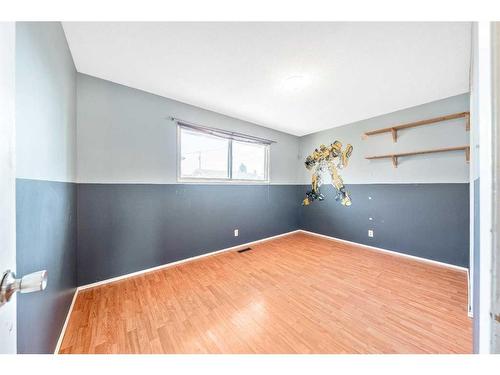 47 Queen Isabella Close Se, Calgary, AB - Indoor Photo Showing Other Room