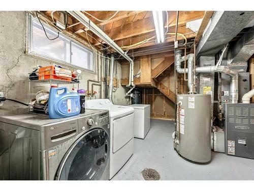 47 Queen Isabella Close Se, Calgary, AB - Indoor Photo Showing Laundry Room