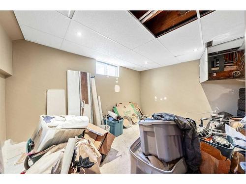 47 Queen Isabella Close Se, Calgary, AB - Indoor Photo Showing Basement