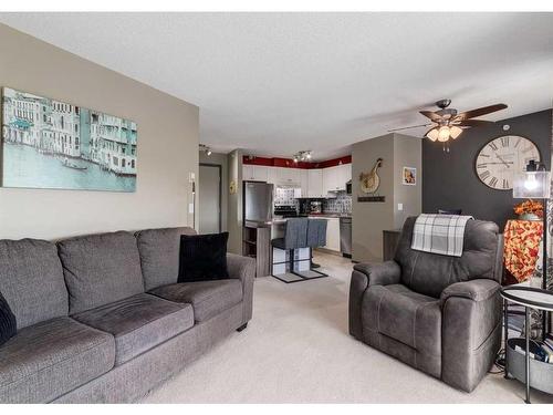 410-6000 Somervale Court Sw, Calgary, AB - Indoor Photo Showing Living Room