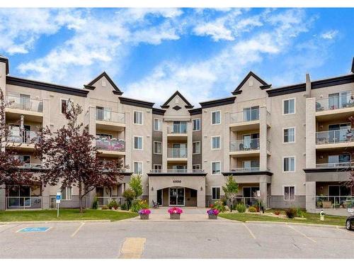 410-6000 Somervale Court Sw, Calgary, AB - Outdoor With Balcony With Facade