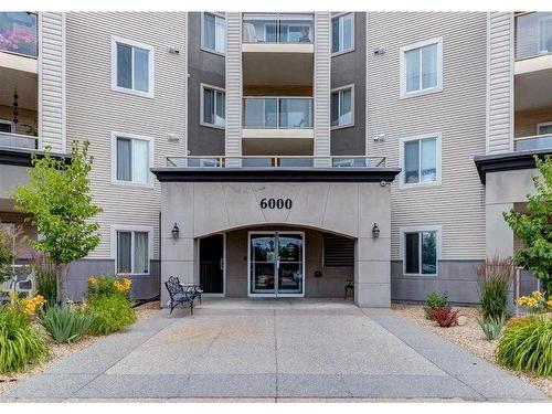 410-6000 Somervale Court Sw, Calgary, AB - Outdoor With Balcony With Facade