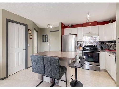 410-6000 Somervale Court Sw, Calgary, AB - Indoor Photo Showing Kitchen