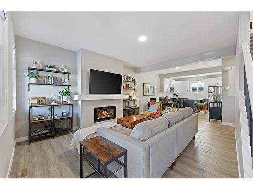 139 Wolf Creek Avenue Se, Calgary, AB - Indoor Photo Showing Living Room With Fireplace