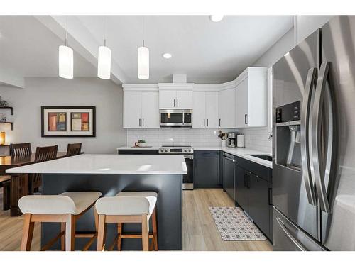 139 Wolf Creek Avenue Se, Calgary, AB - Indoor Photo Showing Kitchen With Stainless Steel Kitchen With Upgraded Kitchen