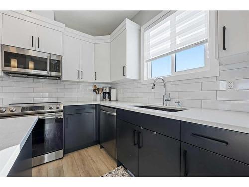 139 Wolf Creek Avenue Se, Calgary, AB - Indoor Photo Showing Kitchen With Stainless Steel Kitchen With Upgraded Kitchen