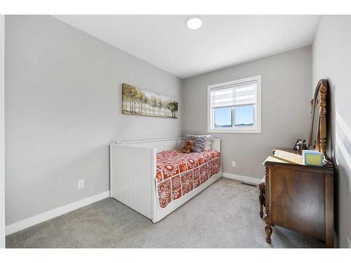 139 Wolf Creek Avenue Se, Calgary, AB - Indoor Photo Showing Bedroom