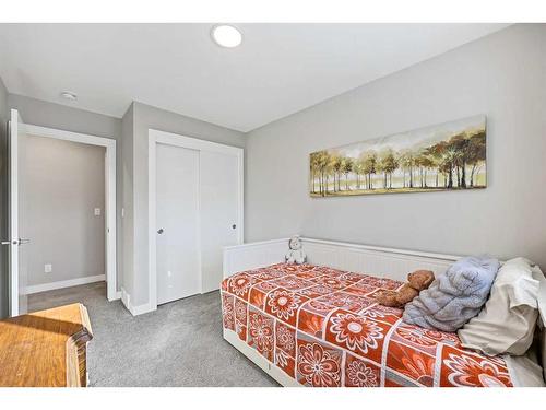 139 Wolf Creek Avenue Se, Calgary, AB - Indoor Photo Showing Bedroom