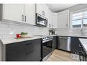 139 Wolf Creek Avenue Se, Calgary, AB  - Indoor Photo Showing Kitchen With Stainless Steel Kitchen With Upgraded Kitchen 