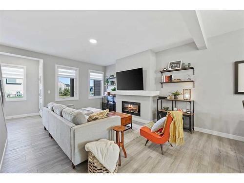 139 Wolf Creek Avenue Se, Calgary, AB - Indoor Photo Showing Living Room With Fireplace