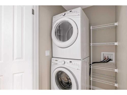 77 Auburn Meadows View Se, Calgary, AB - Indoor Photo Showing Laundry Room