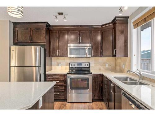 77 Auburn Meadows View Se, Calgary, AB - Indoor Photo Showing Kitchen With Stainless Steel Kitchen With Double Sink With Upgraded Kitchen