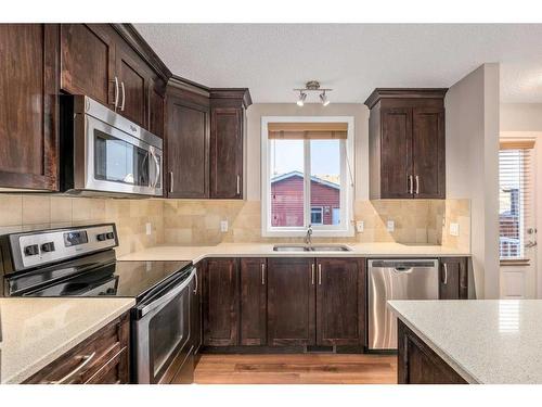 77 Auburn Meadows View Se, Calgary, AB - Indoor Photo Showing Kitchen With Stainless Steel Kitchen With Double Sink