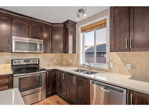 77 Auburn Meadows View Se, Calgary, AB - Indoor Photo Showing Kitchen With Stainless Steel Kitchen With Double Sink With Upgraded Kitchen