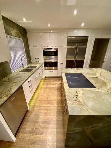 47 Fairview Drive Se, Calgary, AB - Indoor Photo Showing Kitchen With Double Sink