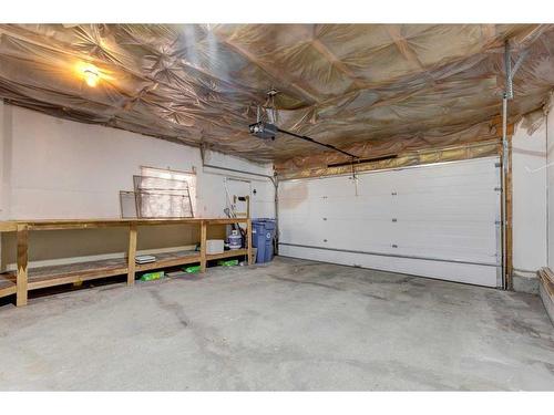 28 Hawkdale Close Nw, Calgary, AB - Indoor Photo Showing Garage