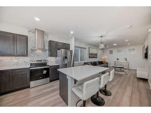 310 Aquila Way Nw, Calgary, AB - Indoor Photo Showing Kitchen With Stainless Steel Kitchen With Upgraded Kitchen