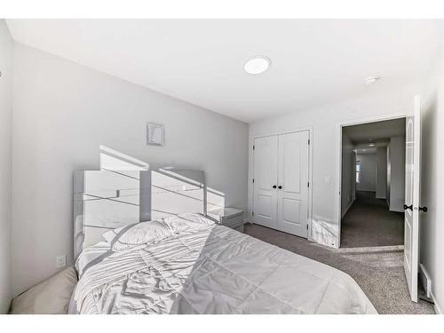 310 Aquila Way Nw, Calgary, AB - Indoor Photo Showing Bedroom