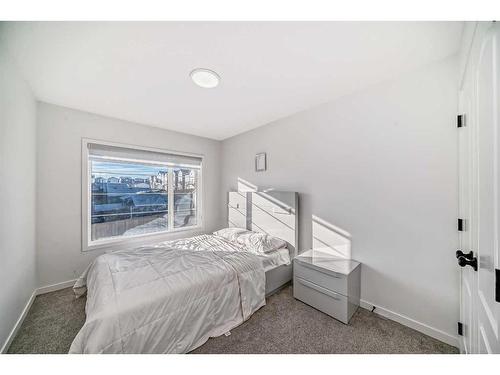 310 Aquila Way Nw, Calgary, AB - Indoor Photo Showing Bedroom