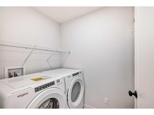 310 Aquila Way Nw, Calgary, AB - Indoor Photo Showing Laundry Room