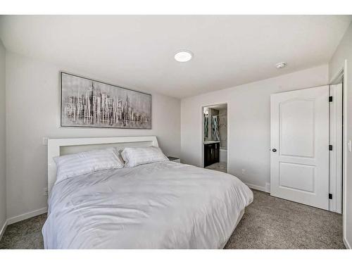 310 Aquila Way Nw, Calgary, AB - Indoor Photo Showing Bedroom