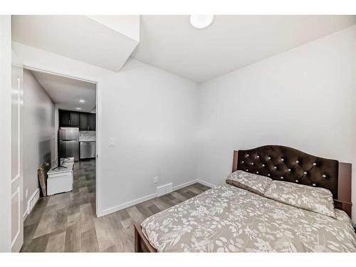 310 Aquila Way Nw, Calgary, AB - Indoor Photo Showing Bedroom