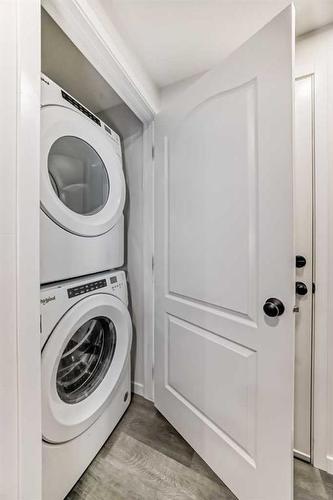 310 Aquila Way Nw, Calgary, AB - Indoor Photo Showing Laundry Room