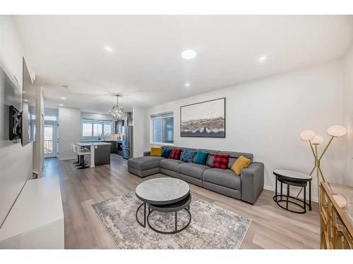 310 Aquila Way Nw, Calgary, AB - Indoor Photo Showing Living Room