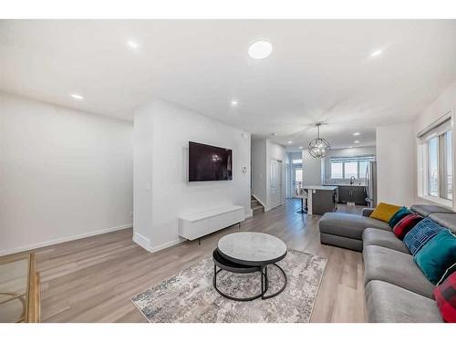 310 Aquila Way Nw, Calgary, AB - Indoor Photo Showing Living Room