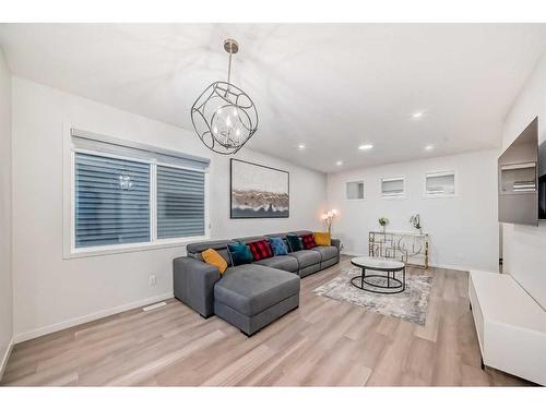 310 Aquila Way Nw, Calgary, AB - Indoor Photo Showing Living Room