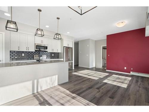 101-360 Harvest Hills Common Ne, Calgary, AB - Indoor Photo Showing Kitchen With Upgraded Kitchen